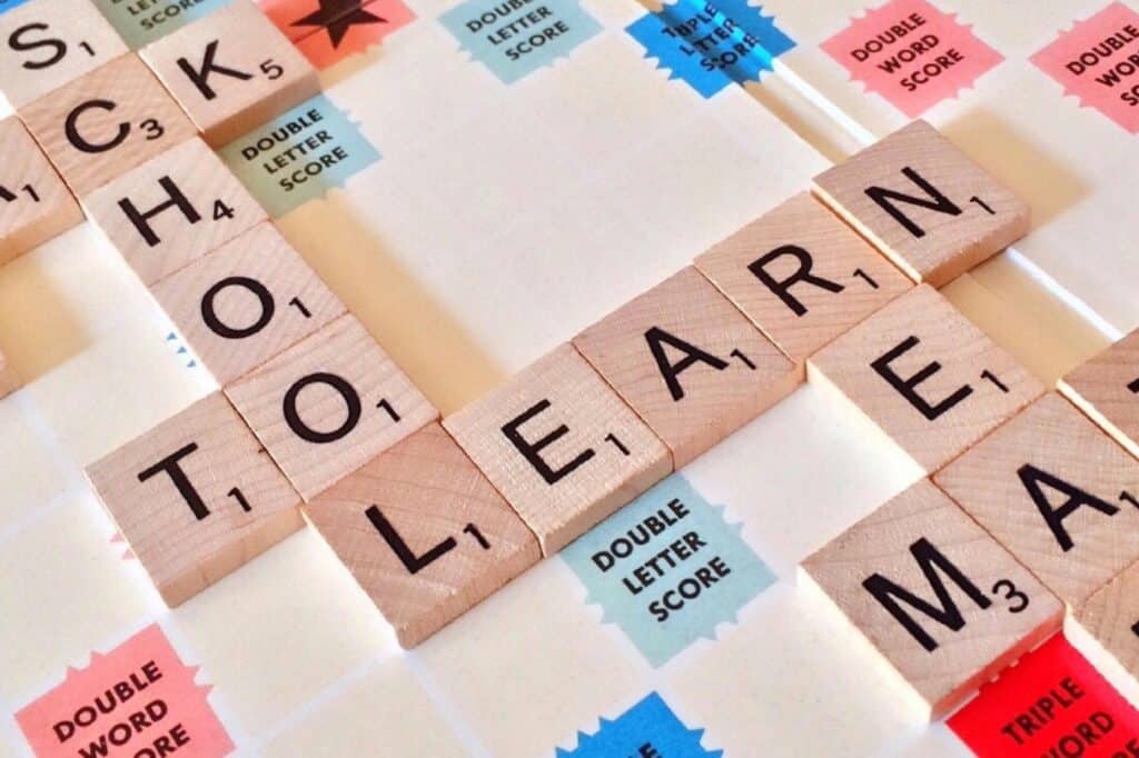 Lettered tiles with the words: school, to, and learn, in the concept of top schools in Hounslow.