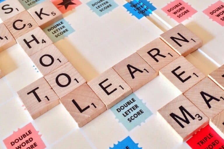 Lettered tiles with the words: school, to, and learn, in the concept of top schools in Hounslow.