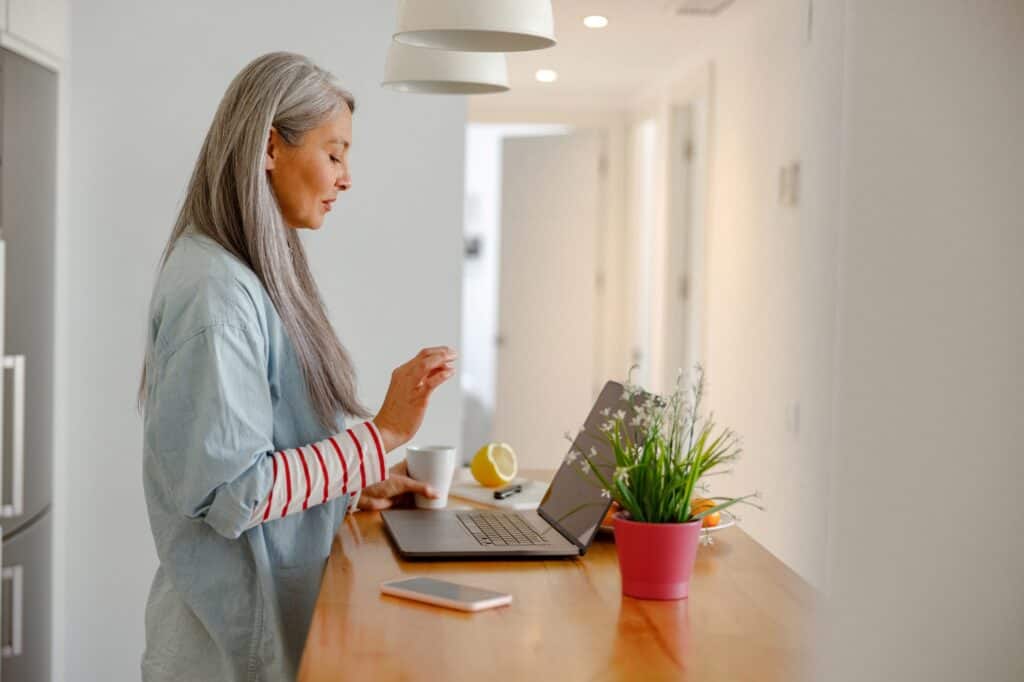 A woman booking the house removals online